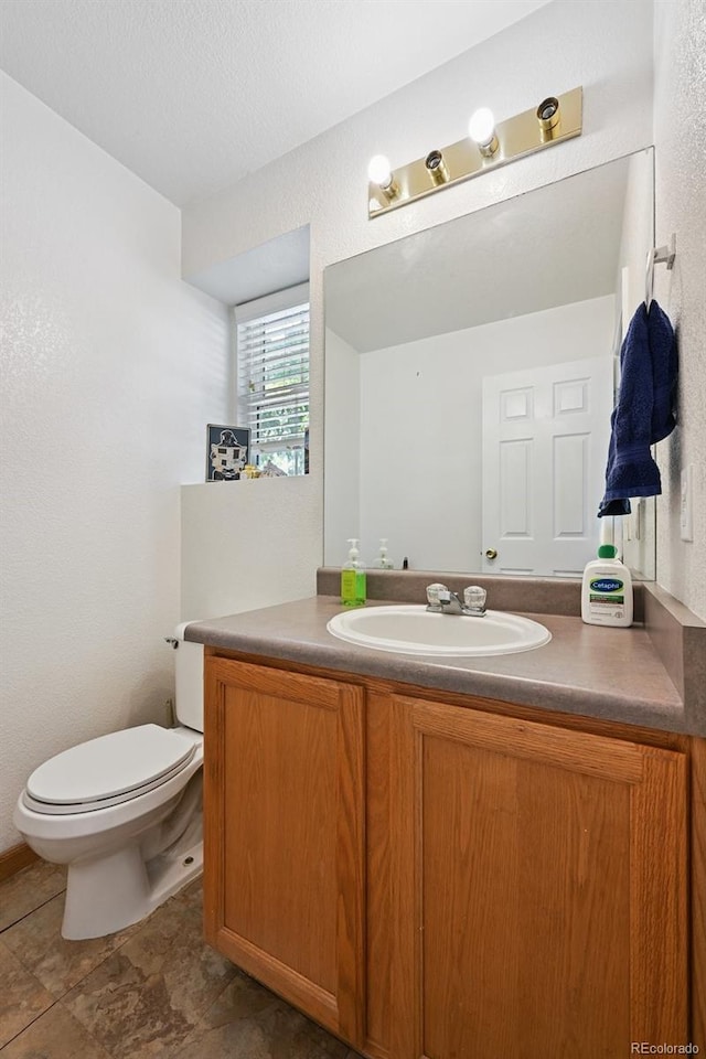 10223 Vine Ct, Thornton, CO 80229 - bathroom featuring vanity and toilet