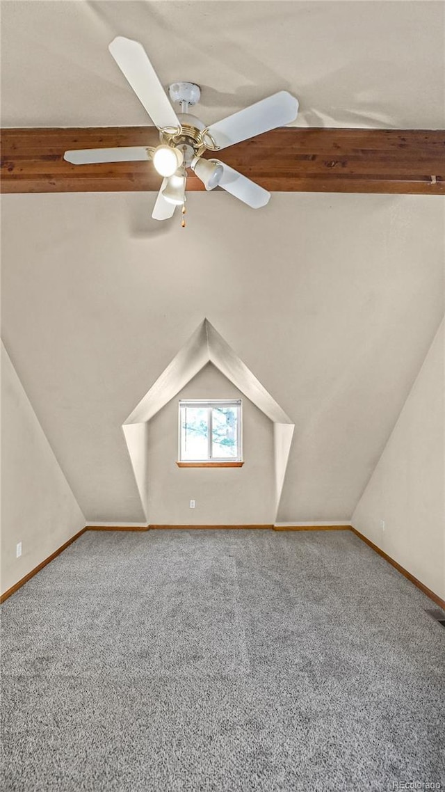 additional living space with carpet flooring, ceiling fan, and lofted ceiling