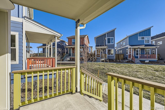 wooden terrace with a porch