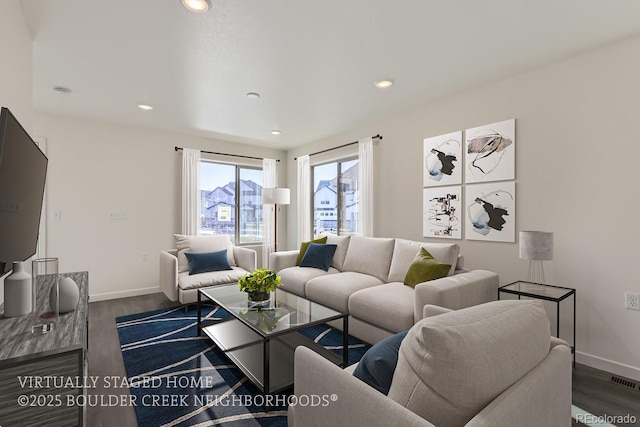 living room featuring dark hardwood / wood-style flooring