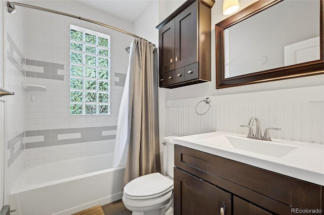 3421 E 16th Ave, Denver, CO 80206 - bathroom featuring shower / tub combo, vanity, a wainscoted wall, and wood finished floors