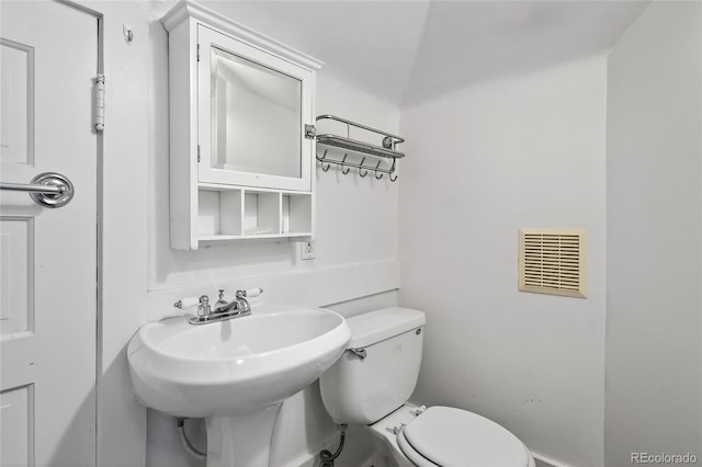 3421 E 16th Ave, Denver, CO 80206 - bathroom featuring toilet and a sink