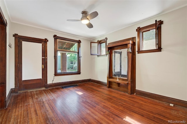 3421 E 16th Ave, Denver, CO 80206 - unfurnished room with wood finished floors, a ceiling fan, and crown molding