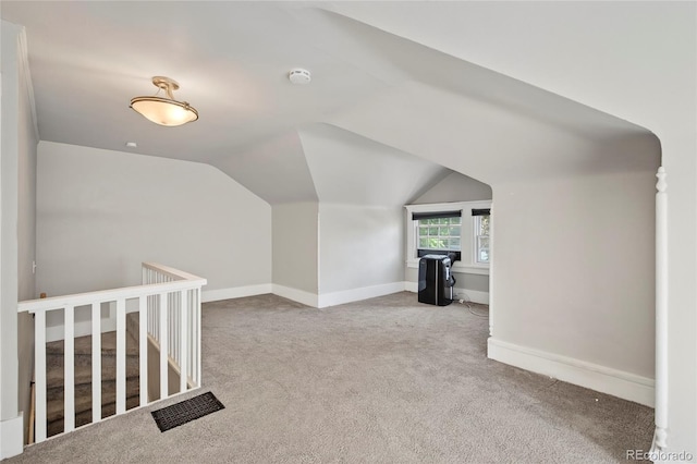 3421 E 16th Ave, Denver, CO 80206 - additional living space with vaulted ceiling and carpet floors