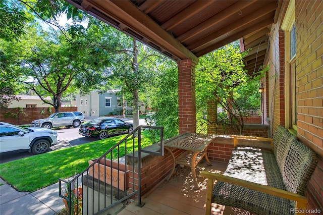 3421 E 16th Ave, Denver, CO 80206 - covered porch with a lawn