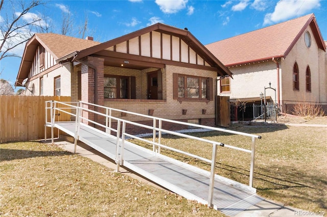 exterior space featuring brick siding, board and batten siding, and a shingled roof