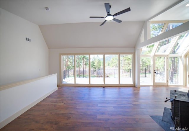 14546 Pine View Rd, Larkspur, CO 80118 - unfurnished living room featuring a wood stove, high vaulted ceiling, ceiling fan, wood finished floors, and baseboards