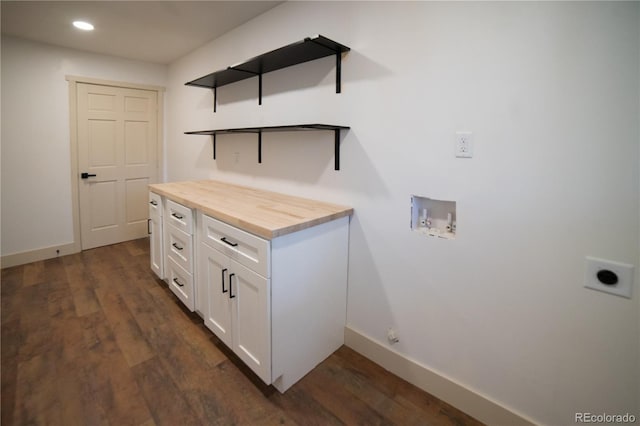 14546 Pine View Rd, Larkspur, CO 80118 - washroom with electric dryer hookup, washer hookup, baseboards, dark wood finished floors, and recessed lighting