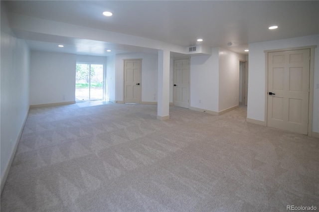 14546 Pine View Rd, Larkspur, CO 80118 - below grade area featuring recessed lighting, light colored carpet, and baseboards