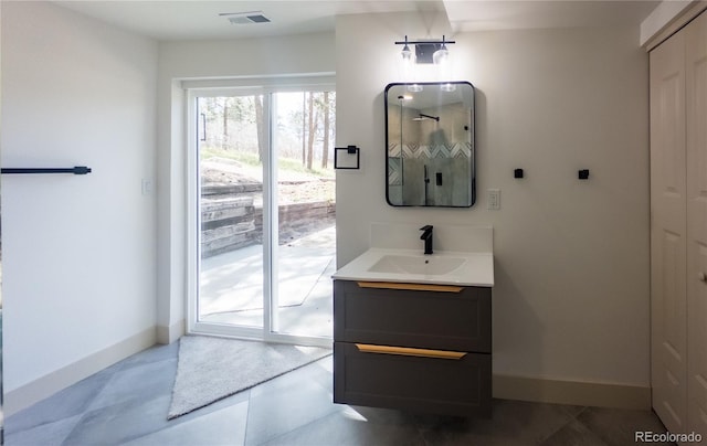14546 Pine View Rd, Larkspur, CO 80118 - bathroom featuring vanity and baseboards