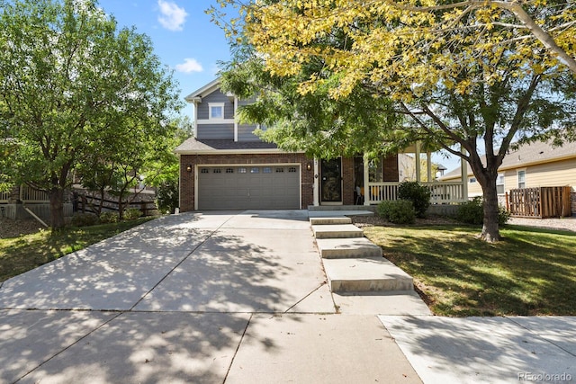 view of front of house featuring a garage and a front yard