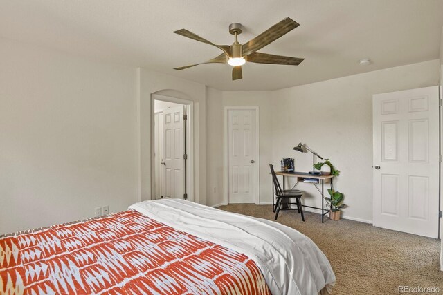 carpeted bedroom featuring ceiling fan