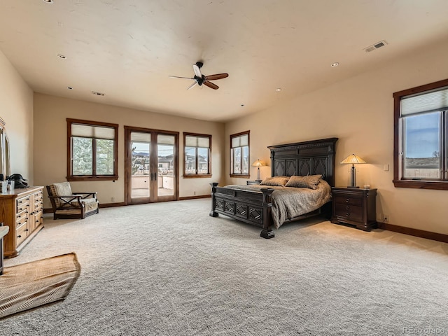 bedroom with baseboards, visible vents, access to exterior, and light colored carpet