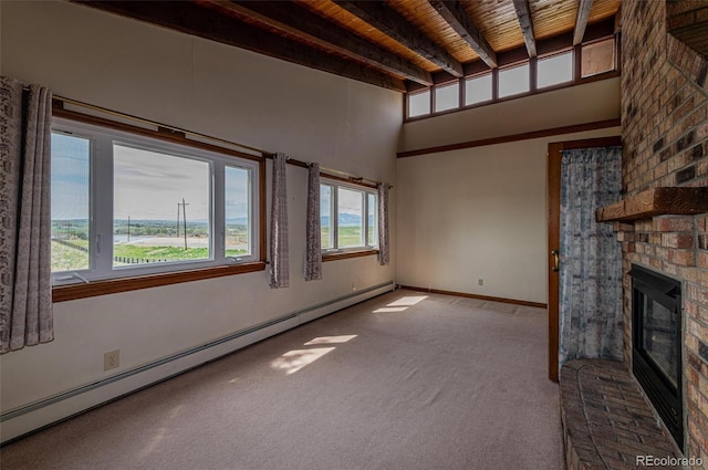 4586 N 95th St, Lafayette, CO 80026 - unfurnished living room featuring a baseboard radiator, a wood ceiling with exposed beams, carpet, and a fireplace