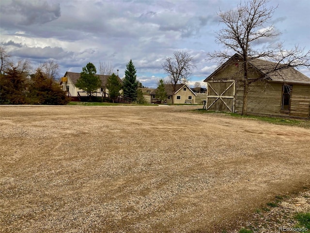 4586 N 95th St, Lafayette, CO 80026 - view of yard with a barn and an outdoor structure