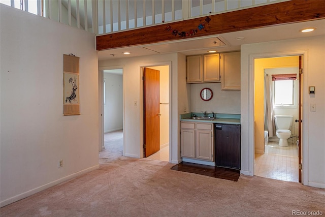 4586 N 95th St, Lafayette, CO 80026 - kitchen with black dishwasher, light colored carpet, light countertops, and recessed lighting