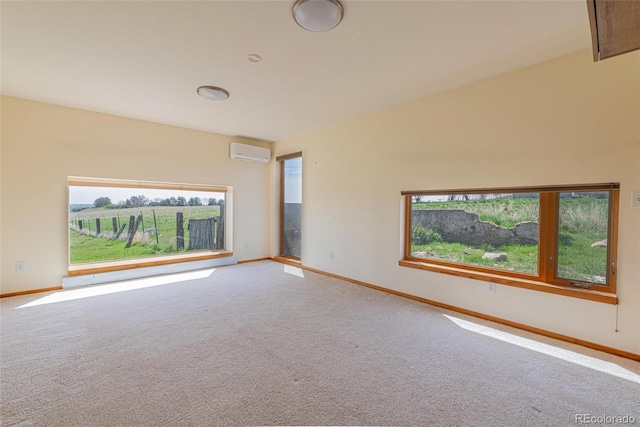 4586 N 95th St, Lafayette, CO 80026 - spare room featuring a wall mounted air conditioner, healthy amount of natural light, and carpet