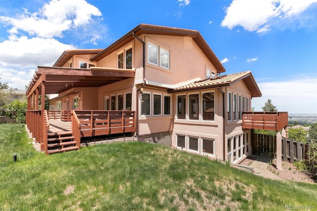 4 Pine Rd, Colorado Springs, CO 80906 - rear view of property with stucco siding and a wooden deck