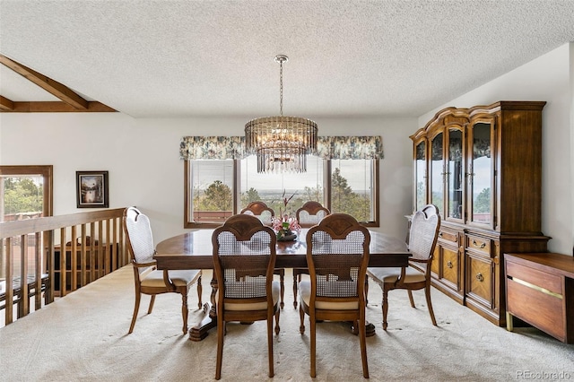 4 Pine Rd, Colorado Springs, CO 80906 - carpeted dining space with a chandelier and a textured ceiling