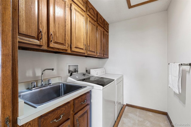 4 Pine Rd, Colorado Springs, CO 80906 - laundry room featuring washing machine and dryer, cabinet space, light carpet, and baseboards