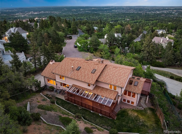 4 Pine Rd, Colorado Springs, CO 80906 - aerial view of property and surrounding area featuring a heavily wooded area