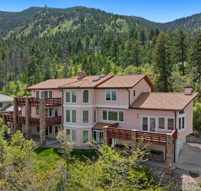 4 Pine Rd, Colorado Springs, CO 80906 - view of mountain backdrop with a heavily wooded area