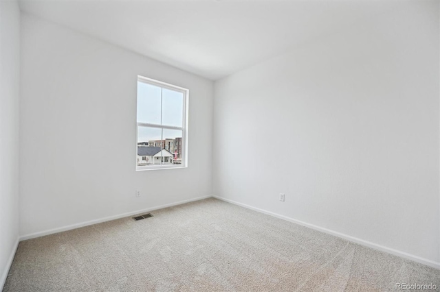 empty room with carpet floors