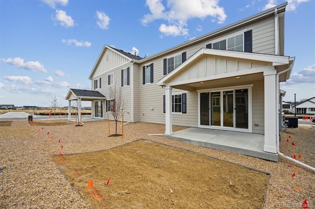 back of house featuring a patio and central AC unit