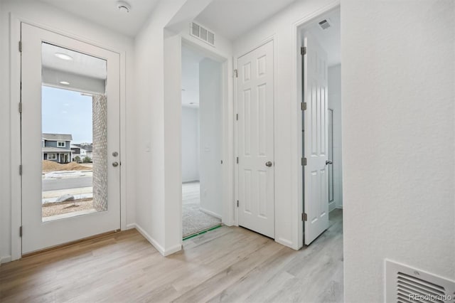 entrance foyer featuring light wood-type flooring