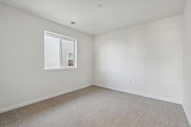 unfurnished room featuring carpet floors