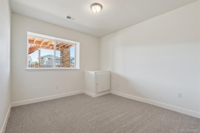 view of carpeted spare room