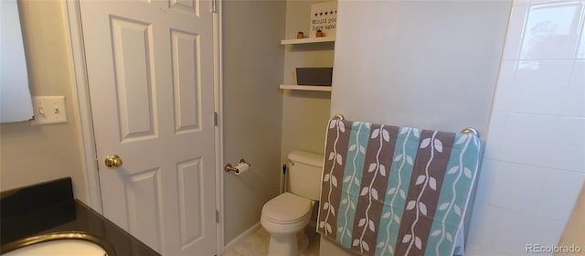 4220 E 119th Pl Unit A, Thornton, CO 80233 - bathroom featuring toilet and a sink