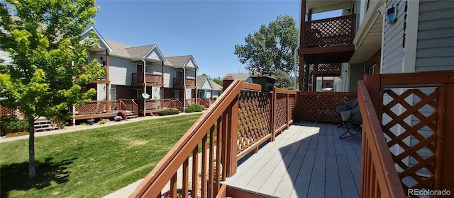 4220 E 119th Pl Unit A, Thornton, CO 80233 - wooden deck with a residential view and a lawn