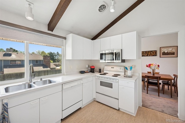 3832 S Quebec St, Denver, CO 80237 - kitchen featuring white appliances, a sink, light countertops, and white cabinetry