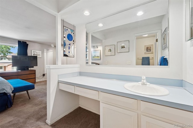 3832 S Quebec St, Denver, CO 80237 - bathroom featuring vanity, baseboards, recessed lighting, carpet flooring, and connected bathroom