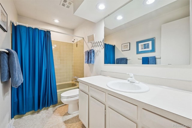 3832 S Quebec St, Denver, CO 80237 - bathroom with toilet, vanity, shower / bathtub combination with curtain, recessed lighting, and tile patterned floors