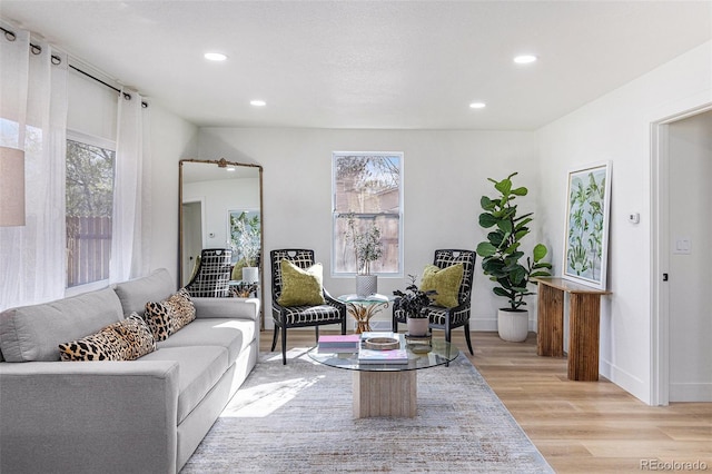 3800 W Eisenhower Blvd, Loveland, CO 80537 - living room featuring recessed lighting, light wood-style floors, and a healthy amount of sunlight