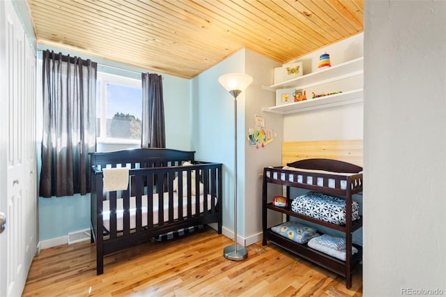 4163 S Decatur St, Englewood, CO 80110 - bedroom with wooden ceiling and wood finished floors