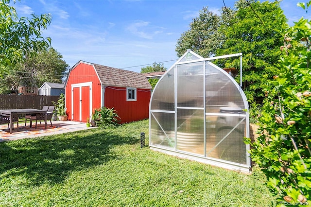 4163 S Decatur St, Englewood, CO 80110 - view of greenhouse featuring a shed