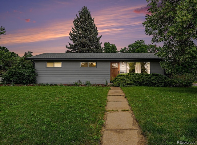 1694 S Elm St, Denver, CO 80222 - ranch-style home featuring a lawn
