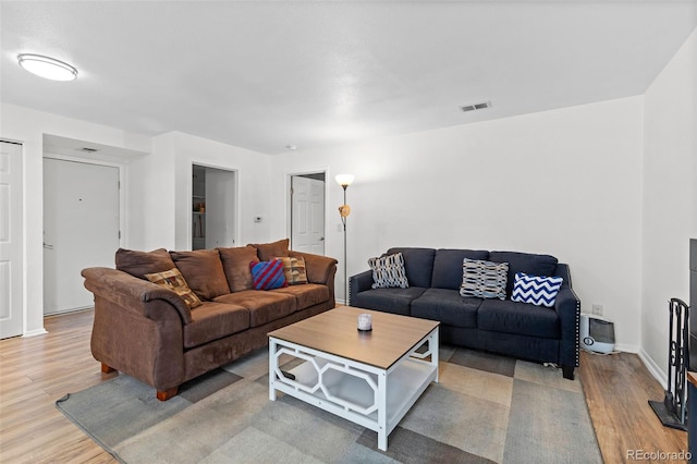 3021 S Ursula Cir Unit 102, Aurora, CO 80014 - living area featuring wood finished floors and baseboards