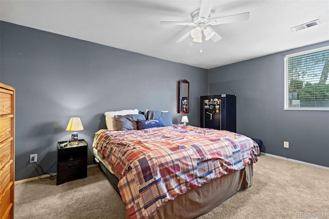 3021 S Ursula Cir Unit 102, Aurora, CO 80014 - bedroom featuring carpet floors, baseboards, and ceiling fan