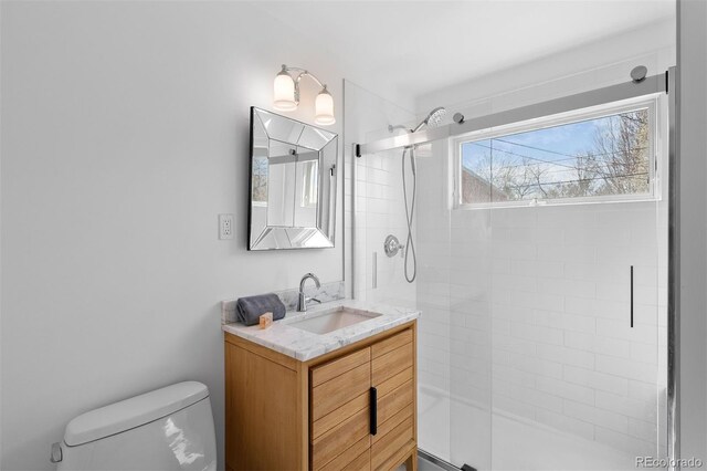 1325 S Grape St, Denver, CO 80222 - full bathroom featuring vanity and tiled shower