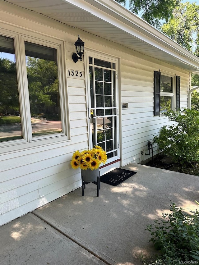 1325 S Grape St, Denver, CO 80222 - doorway to property with a porch