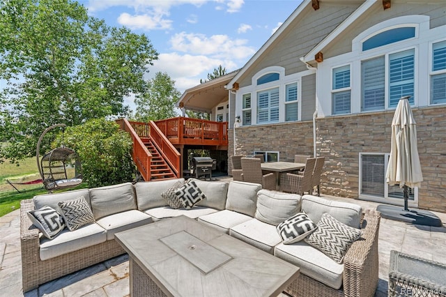 9576 E 147th Pl, Brighton, CO 80602 - view of patio featuring an outdoor hangout area, outdoor dining space, a wooden deck, and stairs