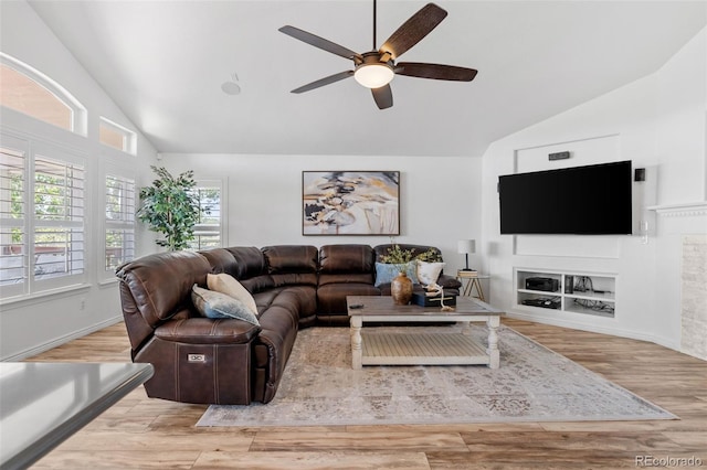 9576 E 147th Pl, Brighton, CO 80602 - living room with a ceiling fan, wood finished floors, and high vaulted ceiling