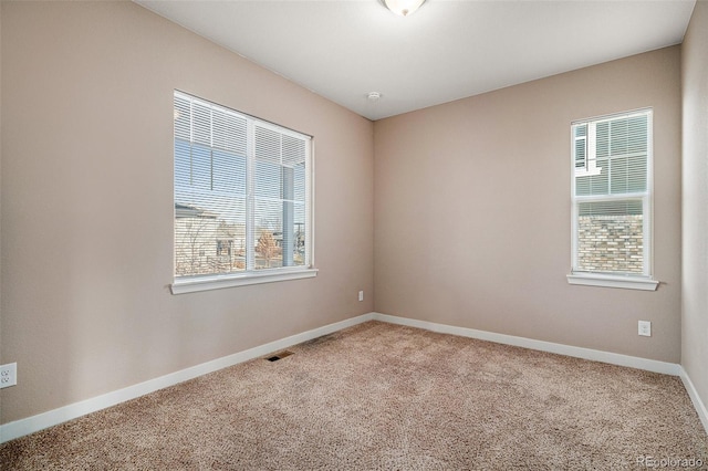 view of carpeted spare room