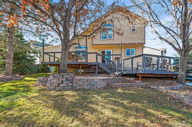 back of property featuring a yard and a deck