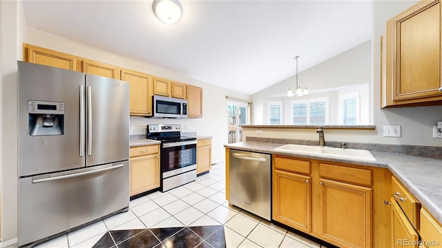 kitchen with stainless steel appliances, vaulted ceiling, light tile patterned floors, pendant lighting, and a notable chandelier