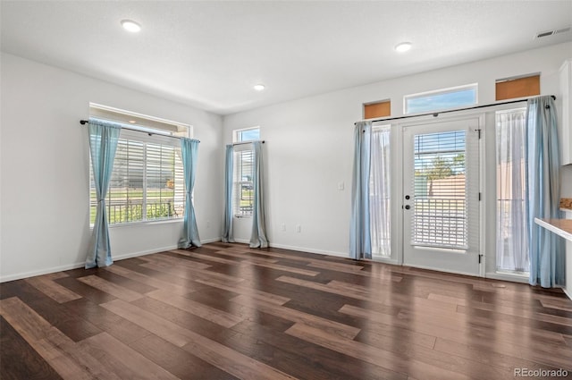 entrance foyer with dark wood-type flooring